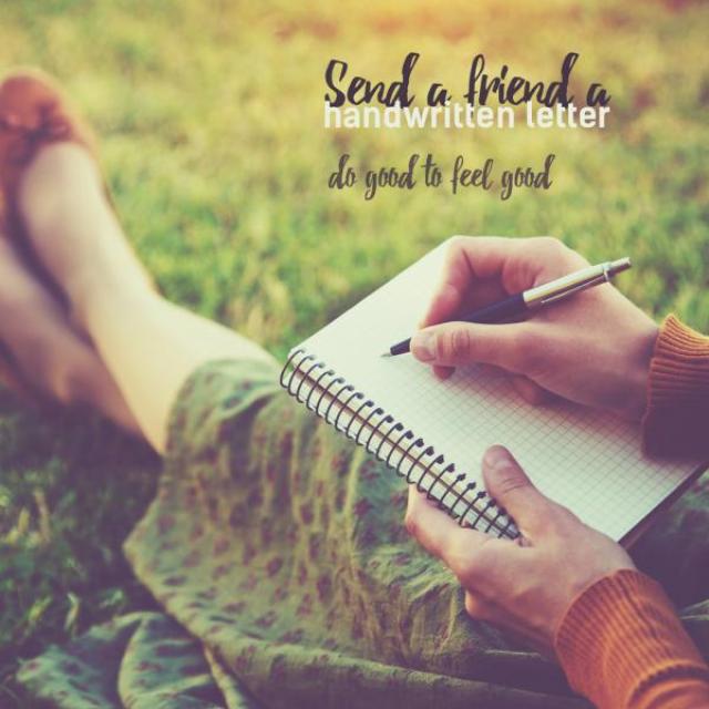 A woman sits in the grass wearing a skirt and holding a notebook and pen in her lap. The text reads, "Send a friend a handwritten letter. do good to feel good.""